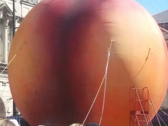 News Report writing prompt: Giant Peach in Cardiff